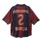 Barcelona x Travis Scott Special Edition Kit – striped retro football jersey back view