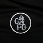 Chelsea Moisés Caicedo 3rd Kit 2025/26 (Premier League) – geometric and blue and black retro football jersey detail view