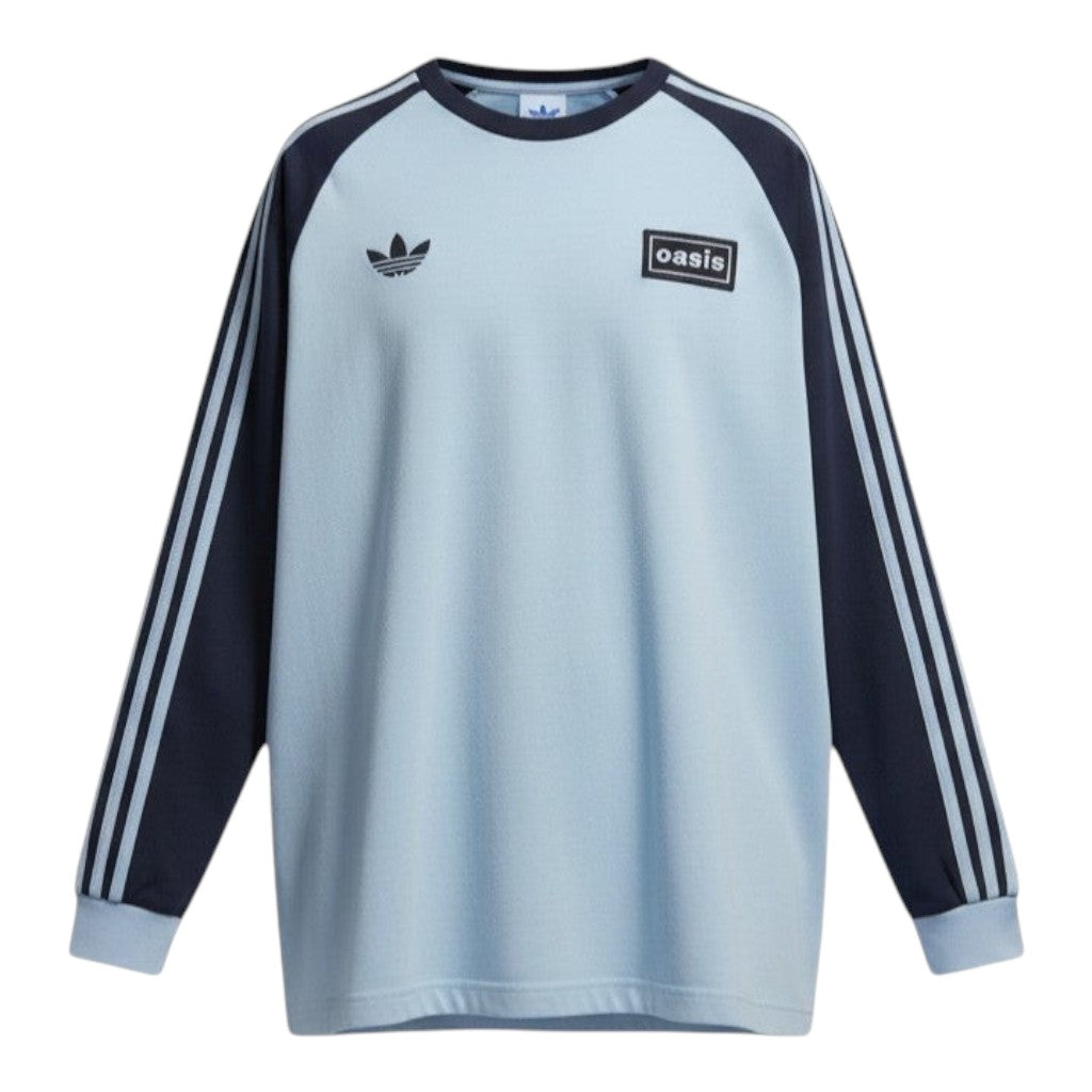 Hinchas Sportswear Store Adidas x Oasis light blue raglan long-sleeve tee with black sleeves and white stripes.