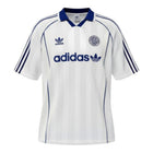 Hinchas Sportswear Store white Adidas Originals retro football jersey with navy stripes and collar, featuring Trefoil logo.