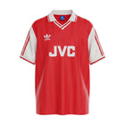 Hinchas Sportswear Store red and white 1986 Arsenal retro home jersey with JVC sponsor, Adidas logo, and cannon crest.