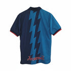 Hinchas Sportswear Store retro Arsenal 1994-95 away jersey. Navy blue with teal lightning bolt pattern and red trim.