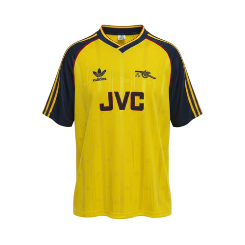 Hinchas Sportswear Store Arsenal 1988-91 retro away jersey, yellow with navy blue sleeves and red trim, Adidas trefoil logo, JVC sponsor.