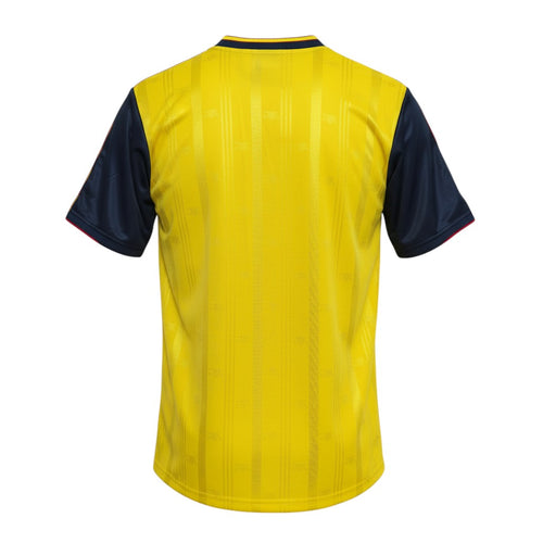 Hinchas Sportswear Store Arsenal 1988-91 retro away jersey, yellow with navy blue sleeves and red trim.