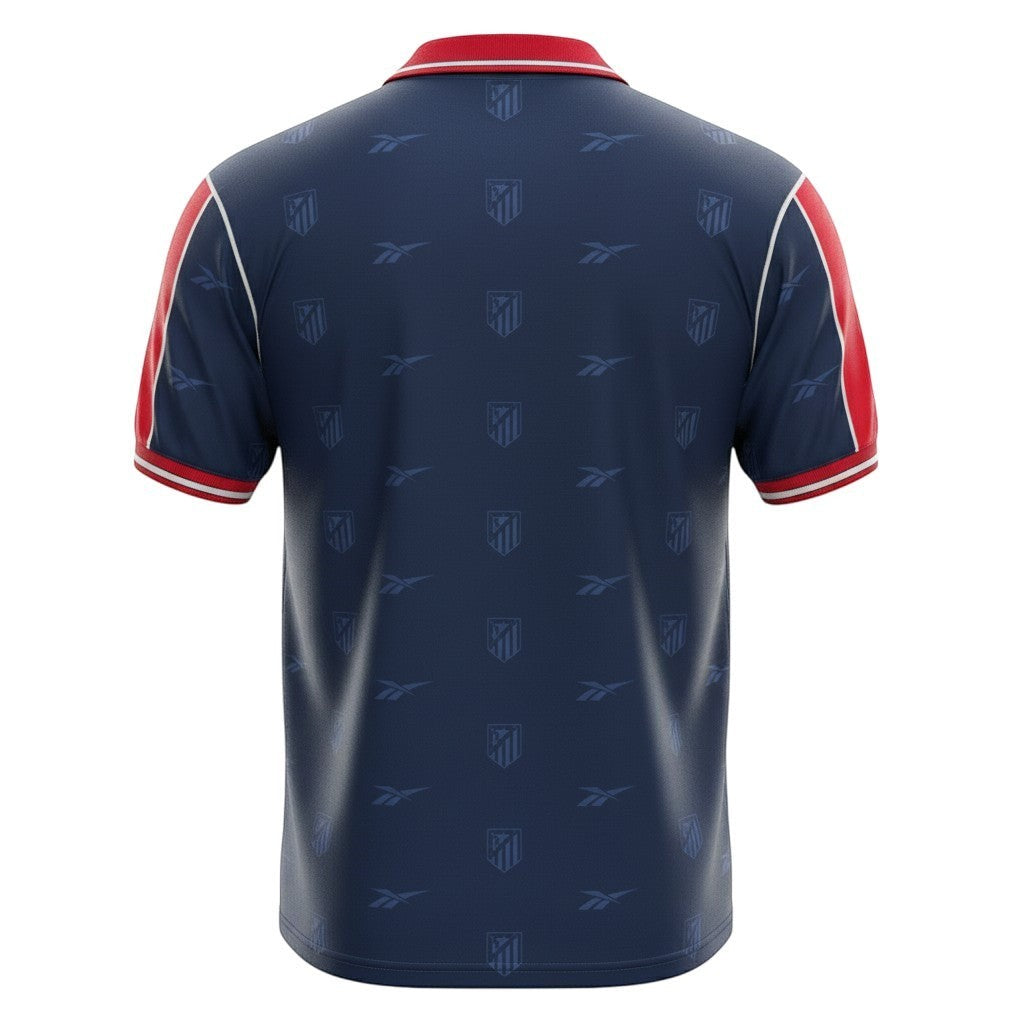 Hinchas Sportswear Store retro Atletico de Madrid 98-99 navy blue jersey with red sleeves and all-over crest pattern.