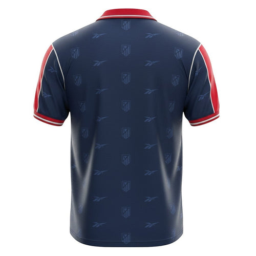 Hinchas Sportswear Store retro Atletico de Madrid 98-99 navy blue jersey with red sleeves and all-over crest pattern.