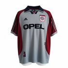 Hinchas Sportswear Store Bayern Munich 1999/00 retro jersey, silver-grey with burgundy raglan sleeves and navy collar. Features Opel sponsor.
