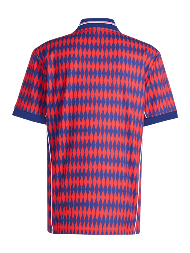 Hinchas Sportswear Store Bayern Munich retro jersey with red and navy diamond pattern, navy collar, and white piping.