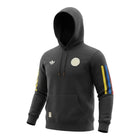 Hinchas Sportswear Store black cotton hoodie with Adidas Originals logo and Colombia crest, featuring tricolor sleeve stripes.