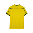 Hinchas Sportswear Store Brazil 1998 World Cup retro jersey, canary yellow with dark green accents on collar and sleeves.