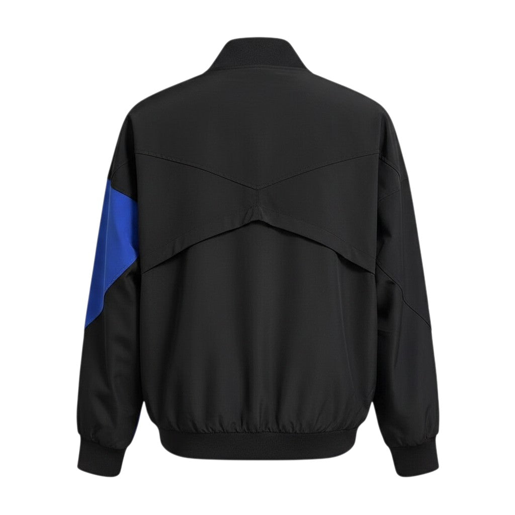 Hinchas Sportswear Store Chelsea FC Nike Anthem Jacket 2025/26 black with royal blue sleeve panel, lightweight woven fabric, full-zip stand collar.