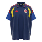 Hinchas Sportswear Store navy blue Colombia training polo with quarter-zip, red stripes, and yellow accents.