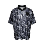 Hinchas Sportswear Store England retro 1990 Umbro away jersey with black, grey, and white geometric pattern, v-neck, and crest.