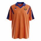 Hinchas Sportswear Store FC Barcelona 1992 retro orange Meyba jersey with blue collar and geometric sleeve panels.