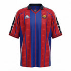 Hinchas Sportswear Store FC Barcelona 1997-98 retro home jersey. Blaugrana vertical stripes, Kappa logo tape on shoulders, jacquard 'Barça' watermark.