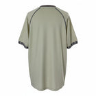 Hinchas Sportswear Store FC Barcelona retro away jersey, sage green with navy trim and striped cuffs.