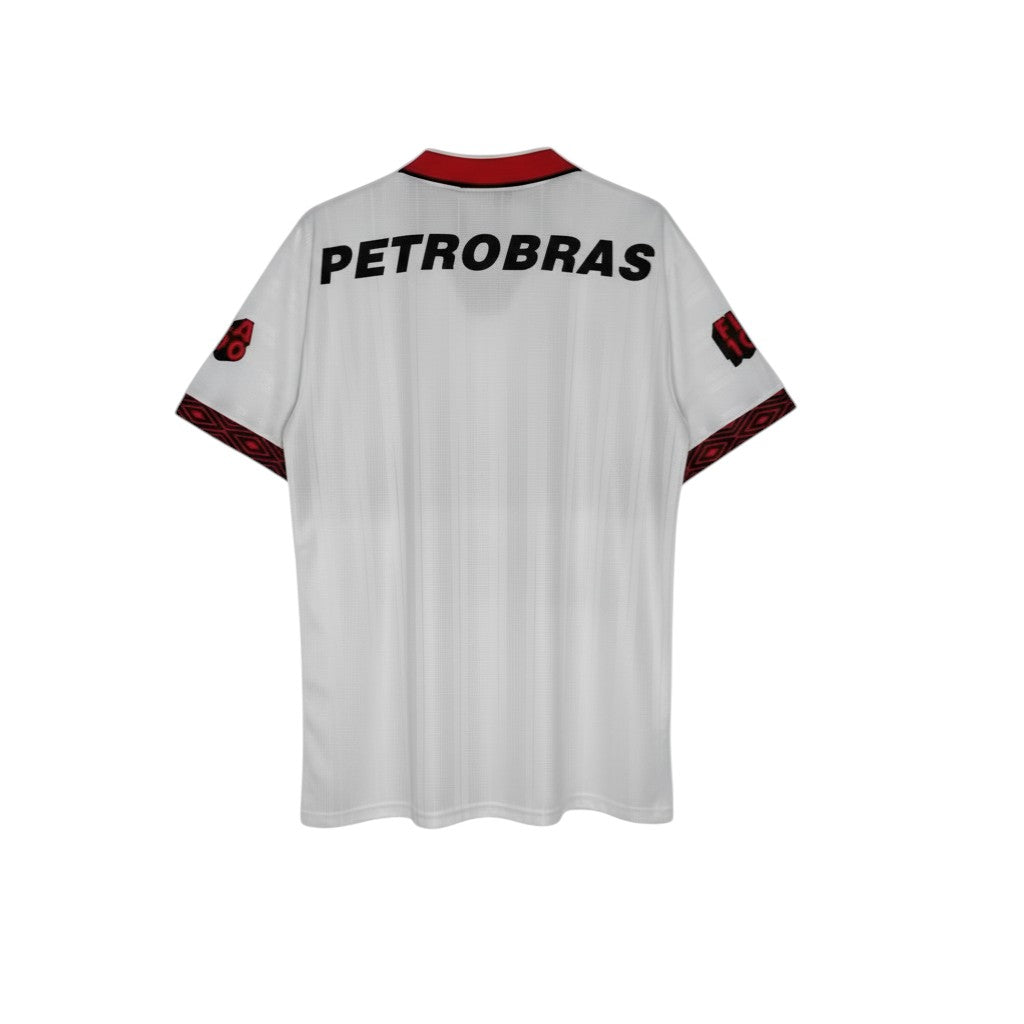 Hinchas Sportswear Store white Flamengo retro jersey with red collar and sleeve trim, featuring "PETROBRAS" on back.