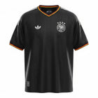 Hinchas Sportswear Store: Black Adidas Originals Germany retro football jersey with white stripes and German flag details on collar and cuffs.