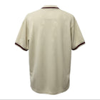 Hinchas Sportswear Store Liverpool FC 1996/97 retro away jersey in cream with maroon trim and all-over Liver Bird jacquard pattern.