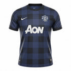 Hinchas Sportswear Store Manchester United 2013-14 navy blue away jersey with black tartan pattern, AON sponsor, and Nike Dri-FIT.