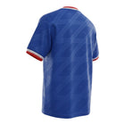 Hinchas Sportswear Store Manchester United 1986-87 royal blue Adidas third jersey with white trim and red accents.