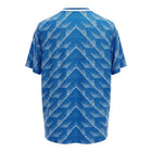 Hinchas Sportswear Store Netherlands 1988 retro away jersey, royal blue with white geometric chevron pattern, white V-neck collar.