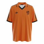 Hinchas Sportswear Store Netherlands 1974-1984 retro home jersey. Orange with red pinstripes, black Adidas stripes on sleeves, V-neck.
