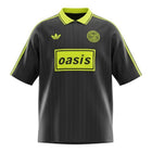 Hinchas Sportswear Store black and neon yellow Oasis x Adidas Originals retro jersey with pinstripe texture, polo collar, and bold logos.