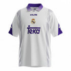 Hinchas Sportswear Store Real Madrid 1994-95 white retro jersey by Kelme with purple collar, Teka sponsor, and silver side panels.