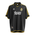 Hinchas Sportswear Store: Black Real Madrid 1999-2000 away jersey by Adidas with gold stripes and Teka sponsor.