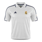 Hinchas Sportswear Store white Adidas Real Madrid 2002-03 retro home jersey with navy stripes and centenary badge.