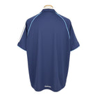 Hinchas Sportswear Store navy blue Real Madrid 2005-06 away jersey with white Adidas stripes and light blue piping. Features a polo collar and Climacool technology.