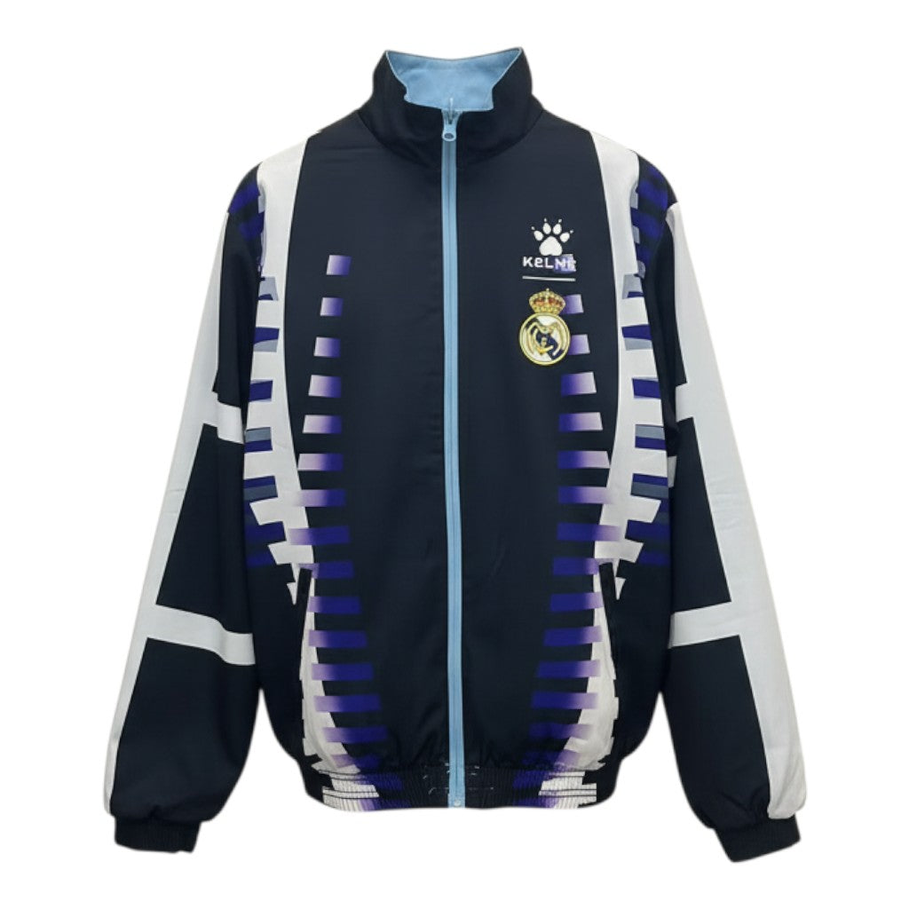 Hinchas Sportswear Store Real Madrid Kelme retro track jacket in navy black with blue and white graphic panels, embroidered crest, and zip closure.