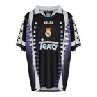 Hinchas Sportswear Store Real Madrid 1996-97 retro away jersey, black with white and purple geometric patterns, Kelme and Teka logos.