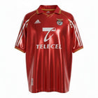 Hinchas Sportswear Store SL Benfica 98/99 retro red football jersey with Telecel sponsor, gold trim polo collar, and white Adidas stripes.